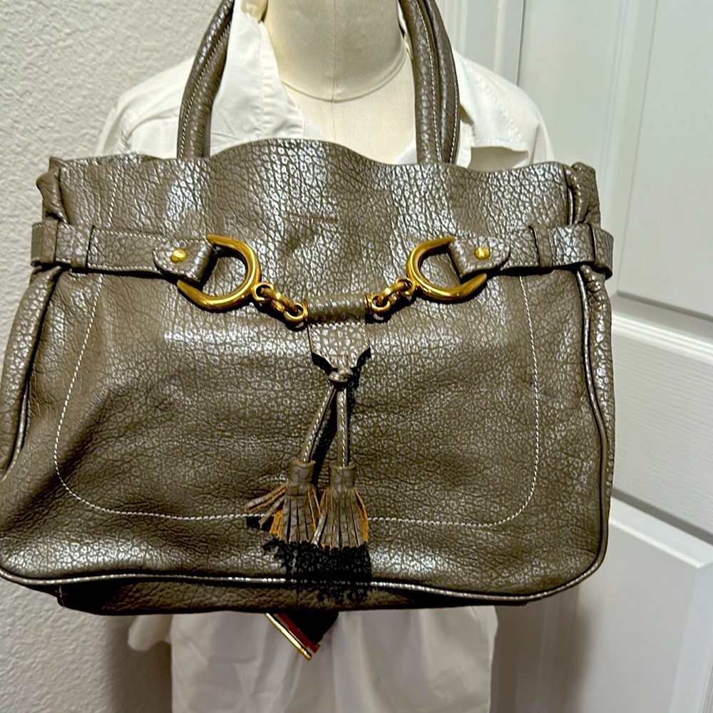 In excellent condition No rips or stain lenght 10" width 14" shoulder drop 8.5"